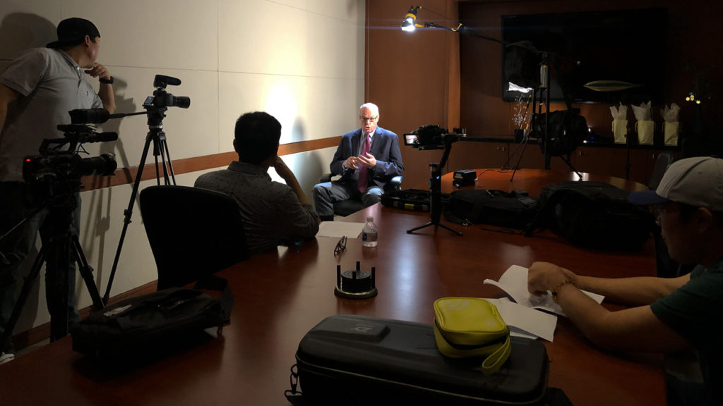 Image: Documentary crew interviewing Richard M. Bowen