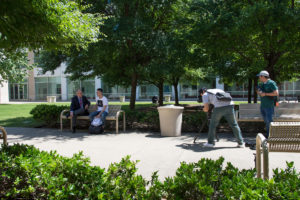 Image: Bowen and student Shengwei Wu talk while documentary crew films