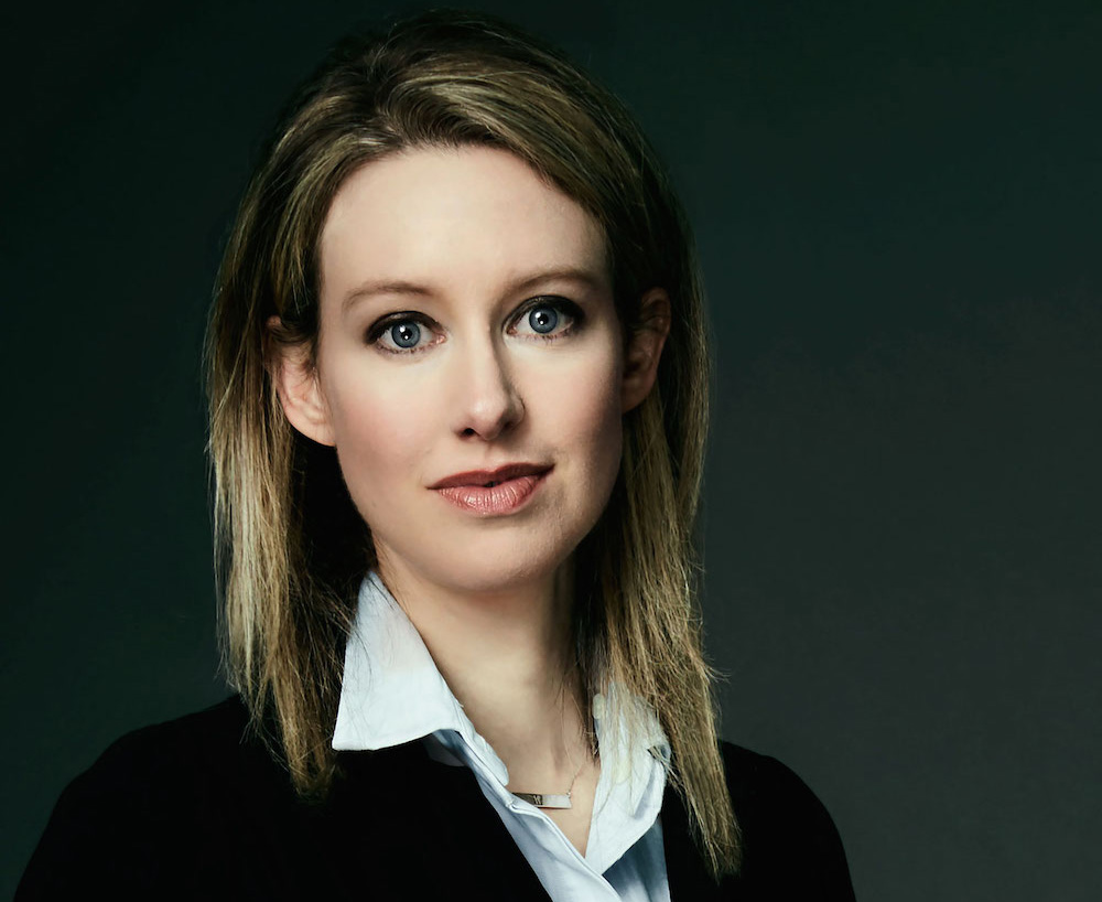 Photo of Elizabeth Holmes wearing a blazer and collared shirt.