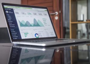 Image: Laptop with stock market screen.